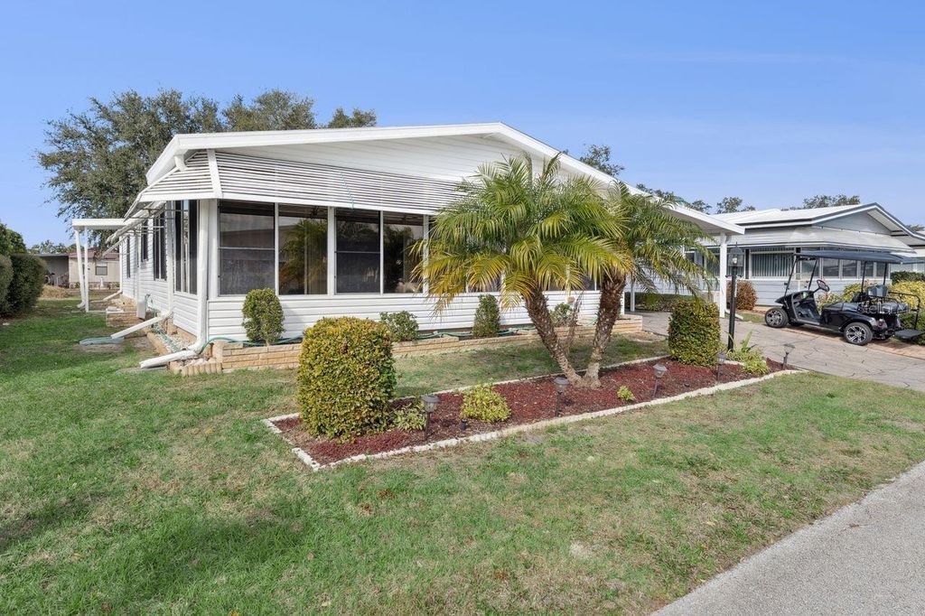 Photo of 6613 Westchester Drive NE, Winter Haven, FL 33881 (MLS # L4958824)