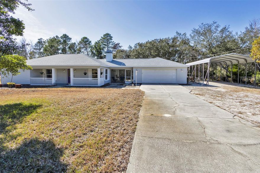 Welcome to 7095 Blackbird Avenue in beautiful Weeki Wachee! This low-maintenance block home with vinyl siding sits on an impressive 0.71 acre lot, a 0.25 acre advantage over most lots in the area, giving you extra space, privacy, and room to enjoy Florida living at its best. Step inside and you'll find a home that has been thoughtfully cared for, including a wood burning fireplace, large bedrooms with walk-in closets, lots of kitchen storage and a newer roof (April 2022) for added peace of mind. A spacious 12x18 covered, screened breezeway offers the perfect spot to relax and enjoy the fresh air, while the oversized 24x27 garage provides excellent functionality with electric service and a tub sink, - ideal for hobbies, projects, or extra storage. For those with outdoor toys, this property truly shines. The 18x40 RV/boat carport with concrete pad gives you the flexibility and protection you need, whether it's for your travel trailer, boat, or additional vehicles. Located close to everything that makes Weeki Wachee special, you'll enjoy convenient access to golf courses, shopping, schools, local theaters, and popular theme parks, plus you're just a short distance to the waterfront, springs, and nature adventures on Florida's stunning Adventure Coast. Whether you're looking for a full-time home or a seasonal retreat, this charming property offers comfort, space, and an unbeatable location. Come take a look—your next chapter starts here!