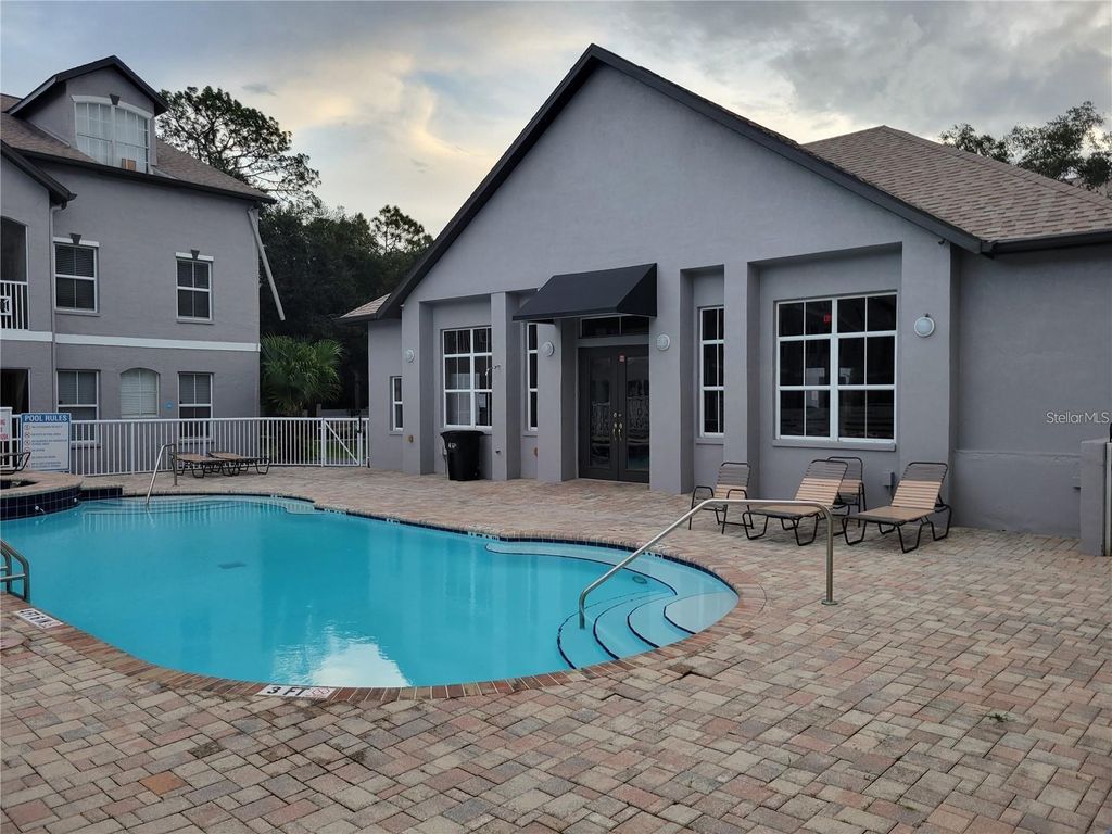 Photo of 5009 Sunridge Palms Drive #104, Tampa, FL 33617 (MLS # TB8464377)