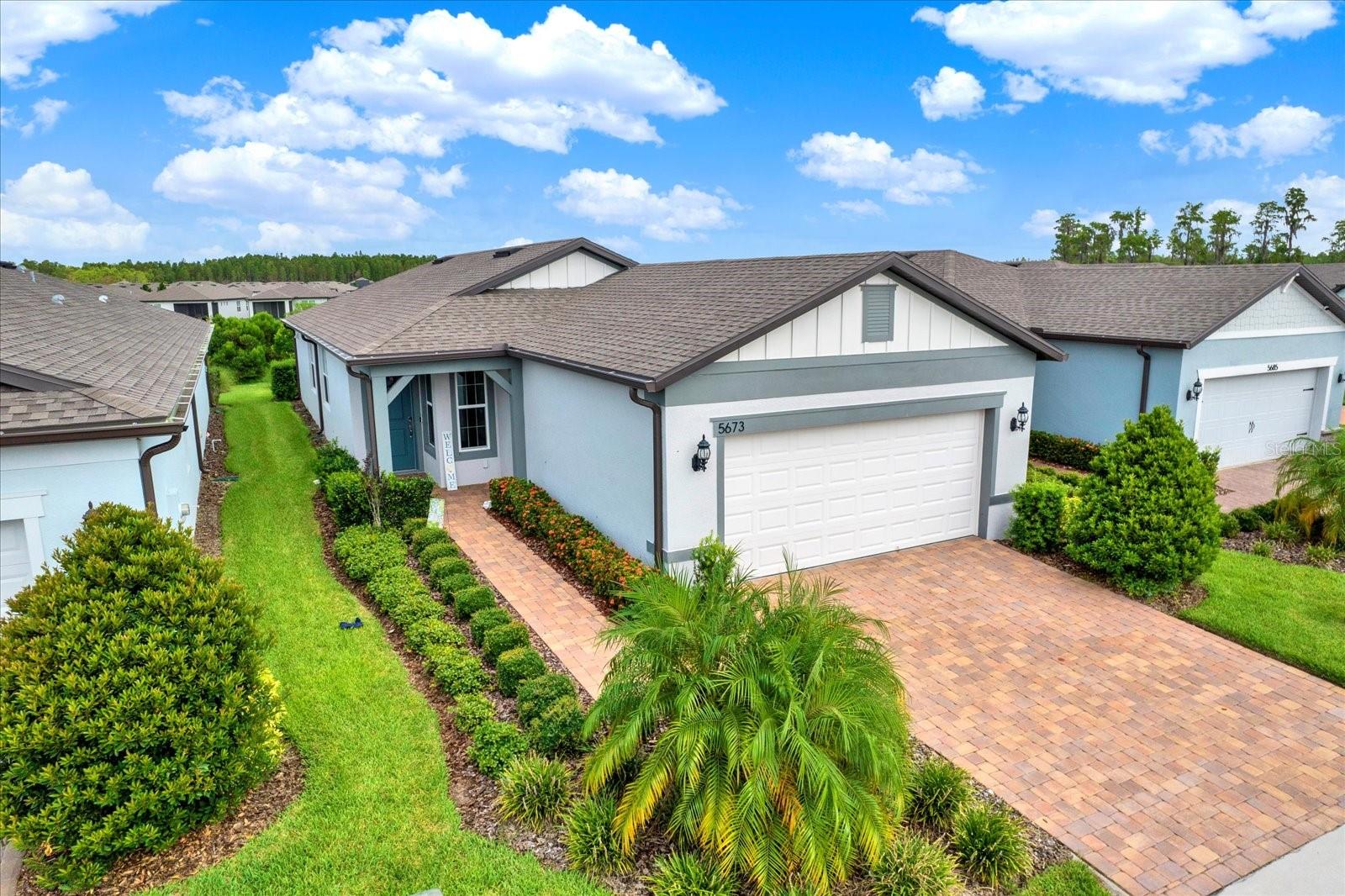 Are you an active adult thinking about your next chapter? Are you ready for a change? Are you ready to be
more social? Welcome to Del Webb, Bexley, master-planned amenity rich 55+ Active Adult community. This
stunning 2-bedroom, 2-bathroom + den, maintenance free, home built in 2021 offers a spacious, light filled
living area that flows into the beautiful kitchen and throughout. This home exudes luxury and comfort.
Experience maximum privacy as the primary suite and en-suite is separated from gathering and guest areas,
not to mention amazing storage space. The screened in lanai is great for drinking your morning coffee or
evening beverage while viewing the peaceful conservation area. The community is golf cart friendly and offers
a restaurant, an on-site director, pools, state of the art gym, community gardening, tennis and so much more.
Come and see what resort style living is about. Only 40 minutes from Tampa International Airport.