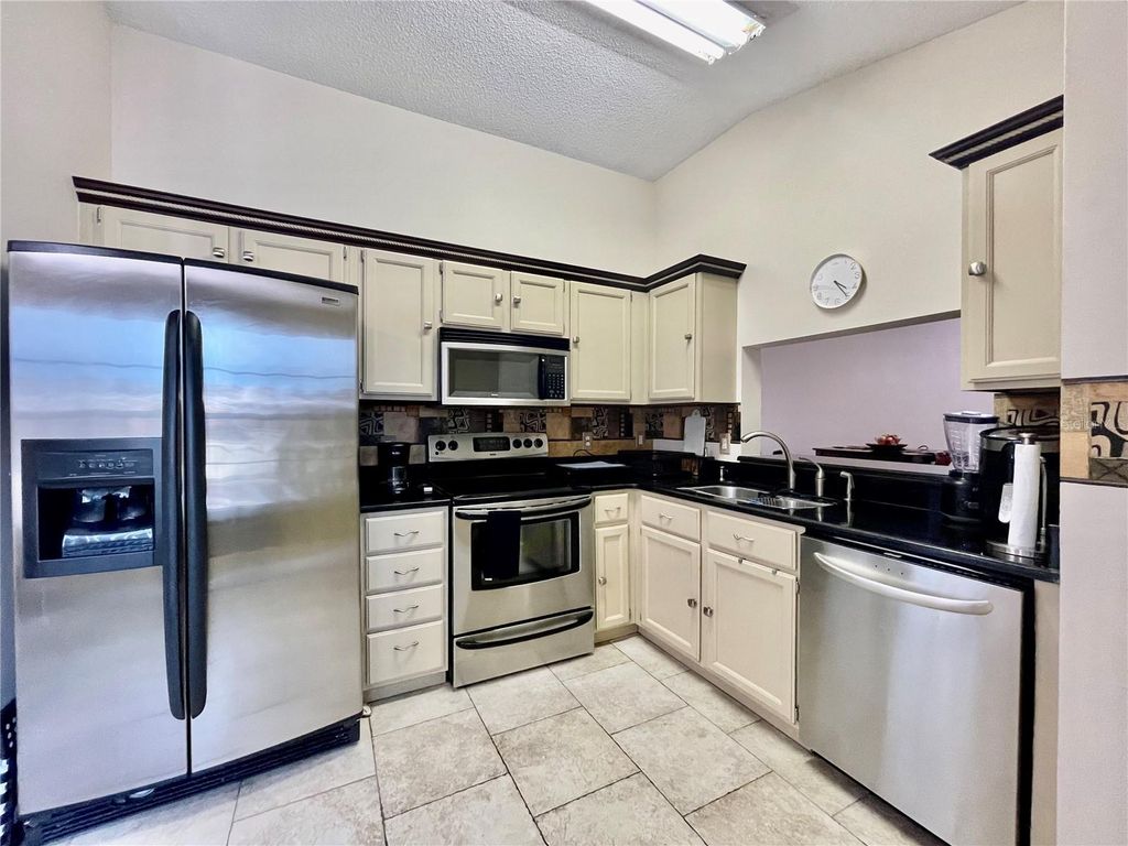 Photo of 2960 Cottage Grove Court #GE, Orlando, FL 32822 (MLS # O6354933)