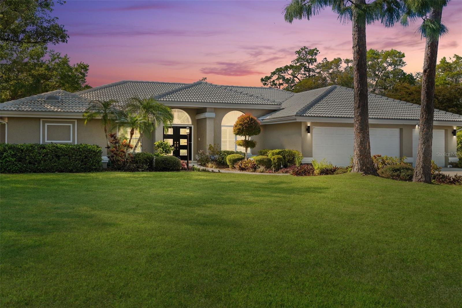WELCOME TO 7300 WAX MYRTLE WAY - SARASOTA'S HIDDEN GEM! READY TO SELL NOW!!!
This extraordinary home at the community’s entrance offers SPECTACULAR LAKE VIEWS that will charm you. Nature surrounds you with the lake at your doorstep and panoramic views from every room. You can fish from your backyard or watch the changing light, as the morning sun makes its way to striking sunsets. A grand oak hides the afternoon sun, and its branches dance over the lake in the early evening. Siesta Key is just 15 minutes drive and WORLD-CLASS golf courses are waiting for you. Downtown Sarasota is minutes away with its fine restaurants, art galleries and shops!
Step through ELEGANT double glass doors into a light-filled sanctuary where the SPARKLING pool and serene lake views take center stage. Professionally landscaped grounds frame this CHIC retreat, with an abundance of NATURAL LIGHT streaming through expansive windows, doors, and skylights. The GREAT ROOM is exciting—think FABULOUS grand fireplace, SOARING ceilings, and BOLD wood beams The kitchen? A PLAYFUL, ART DECO HUB for whipping up feasts or hosting gatherings with plenty of space for CASUAL hangouts or FORMAL soirées.
The layout flows like a BREEZE with a private master suite for well deserved retreats and three additional bedrooms for guests or creative spaces. Picture yourself sipping morning coffee by the pool or unwinding lakeside on a lazy afternoon—The afternoon light shimmers off the classy pool and invites you to enjoy your private cocktail and exquisite view! This home is full of ENDLESS POSSIBILITIES!
BENT TREE is an enchanting fairytale-like private community where whitetail deer, great herons and bald eagles roam alongside friendly neighbors who cherish its exclusive setting. Annual traditions like the December tree lighting bring everyone together, and the top-notch HOA keeps everything flowing. Residents are head-over-heels for the neighborhood’s custom homes, distinctive landscapes, and meandering roads along the many lakes. COME SEE IT, LOVE IT, MAKE IT YOURS! MAKE AN OFFER TODAY!!!