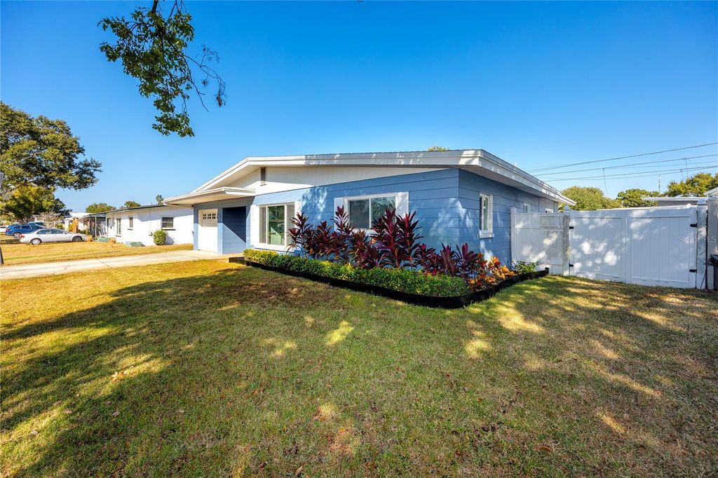 Photo of 5613 35th Avenue N, St Petersburg, FL 33710 (MLS # TB8449963)