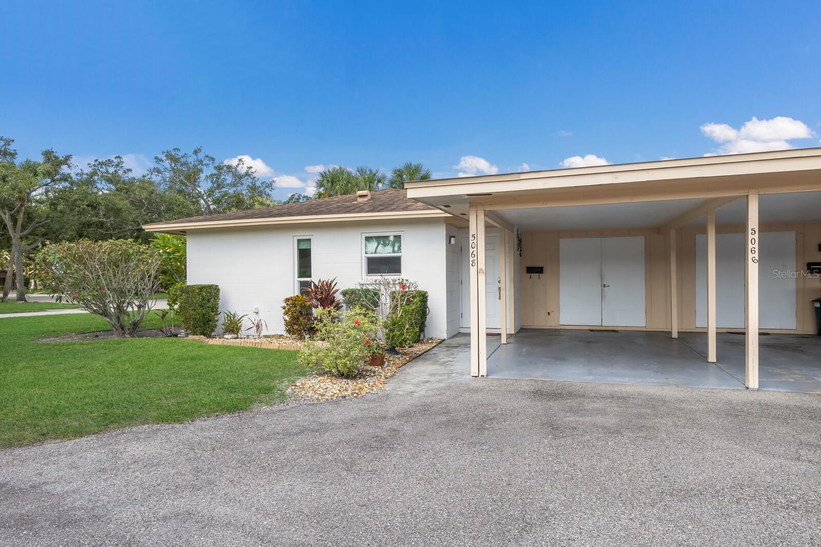 This beautifully updated 2-bedroom, 2-bathroom end unit villa is conveniently located near all that South Bradenton has to offer. The interior is bright and inviting, featuring custom window treatments along with impact-rated doors and windows. The home boasts modern wood-like porcelain tile throughout, and the bathrooms have been recently updated. The spacious kitchen is equipped with newer appliances and offers plenty of counter space. An open design seamlessly connects the living and dining areas, while the split floor plan enhances privacy. The generous master suite includes a large walk-in closet. Additionally, an attached carport provides access to a private washer and dryer in a secured closet. The community features amenities such as a heated pool, shuffleboard, and a welcoming community center. It's just a short drive to the beaches, shopping areas, and essential routes like U.S. Route 41, Cortez Road, as well as the SCF campus and Sarasota Airport. Monthly fees cover cable, internet, exterior insurance, and ground maintenance, making this condo an excellent and affordable.