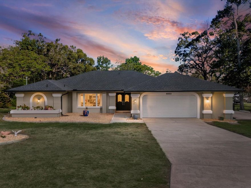 Welcome to this beautifully updated 3-bedroom, 2.5-bath pool home situated on over 1/3 acre along the Clearwater waterway, offering space, privacy, and waterfront living. Enter through elegant double wood doors into a light-filled interior featuring new ceramic plank tile flooring throughout and formal living and dining areas ideal for entertaining. The updated eat-in kitchen is designed for both function and style, with quartz countertops, breakfast bar, dining nook, pantry, and pull-out drawers, all opening to the spacious family room complete with a fieldstone fireplace,  new skylight, and vaulted ceilings.  The primary suite offers a private retreat with two walk-in closets, dual sinks, and a separate shower. Step outside to your own backyard oasis featuring a screened-in pool area with a large covered porch, wall shower, and convenient half bath, perfect for year-round enjoyment. The fenced yard and refurbished dock overlook the tranquil waterway.
Additional features include an oversized 2-car garage, inside laundry room with washer/dryer, storage cabinets and sink, new central vacuum system, new ceiling fans and lighting, fresh interior/exterior paint, interior paneled doors, NEW roof, A/C (2014), electric heated pool, gutters with rain barrel, two storage sheds, and a parking pad for a boat or RV. This property combines comfort, updates, and waterfront living in one exceptional home placing you minutes from some of the Nature Coast’s most popular attractions. Enjoy kayaking, paddleboarding, and the famous mermaid shows at Weeki Wachee Springs State Park, or explore miles of trails and wildlife at Weeki Wachee Preserve. Spend your days boating, fishing, or watching sunsets along the Gulf at nearby Hernando Beach and Pine Island, or visit local parks like Jenkins Creek Park for waterfront recreation.  This home offers the perfect combination of waterfront living, modern updates, and access to Florida’s outdoor lifestyle, all just minutes from shopping, dining, and everyday conveniences.