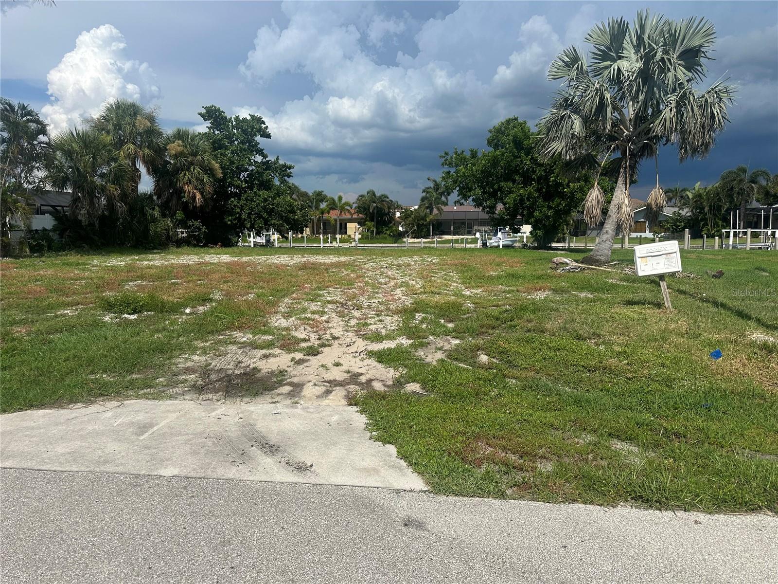 Don’t miss this rare opportunity to own a buildable lot in the highly sought-after sailboat section of Punta Gorda Isles! Ideally located just a few blocks from open water, this prime waterfront property offers direct, deep-water access to Charlotte Harbor and beyond — no bridges!
This is the original sailboat area of PGI, perfect for avid boaters and water lovers seeking quick and easy navigation to the Gulf. Surrounded by upscale homes and serene canals, this lot is the perfect setting to build your custom dream home in one of Southwest Florida’s most prestigious boating communities.
Enjoy the best of coastal living — minutes from historic downtown Punta Gorda, waterfront parks, marinas, shopping, dining, and more.