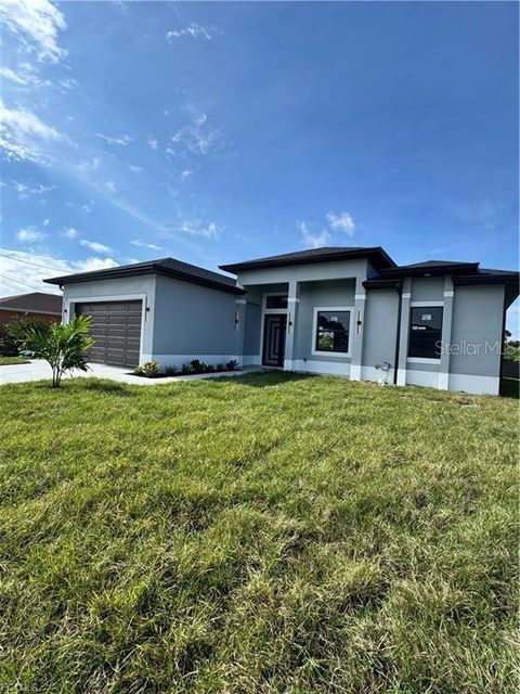 Photo of 54 Tena Avenue S, Lehigh Acres, FL 33976 (MLS # A4674294)