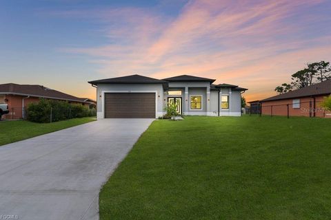 Photo of 54 Tena Avenue S, Lehigh Acres, FL 33976 (MLS # A4674294)