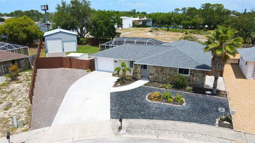 Photo of 8747 Hemlock Lane, Port Richey, FL 34668 (MLS # TB8513054)