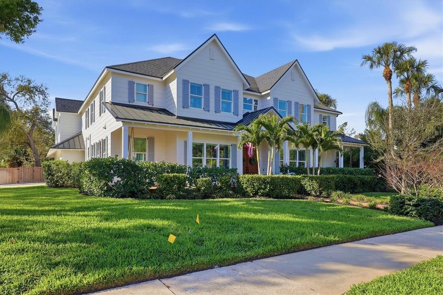 Welcome to this stunning 2021-built home in one of Sarasota's most iconic and picturesque historic neighborhoods, Cherokee Park. Offering luxurious living with thoughtful design, this spacious residence of over 6000 square feet features a desirable first-floor primary suite with a decadent bathroom with soaking tub, oversized marble shower, and access to the covered porch for your morning coffee. The gourmet kitchen is equipped with Wolf and Subzero appliances, marble countertops, a walk-in pantry, oversized island for food prep or casual dining, and sweeping views of the pool and lush backyard. A dedicated dining room provides an elegant setting for formal entertaining. The family room is centrally located for optimal entertaining and boasts a gas fireplace, marble detail, and custom built-ins. The sophisticated den offers custom cabinetry and is ideal for a home office or a sitting room. Upstairs, you'll find four additional bedrooms, each offering ample space and walk-in closet storage, complemented by three full bathrooms. There is a large exercise room / flex space on the 2nd floor which includes counter space and an undercounter refrigerator and relaxation area. The third floor includes a movie room. The first floor laundry room boasts a custom mudroom with shoe cubbies and a built-in desk, conveniently located off the four-car garage. The private guest suite includes a kitchenette, separate laundry, and elevator access, making it ideal for extended family, a live-in nanny or au pair, or visiting guests. This home features beautiful oak flooring throughout, adding warmth and elegance to every room. Impeccable attention to detail is evident in every corner and the rooms are filled with abundant natural light. Step outside to your own private resort-style retreat, complete with a fully equipped outdoor kitchen and bar area, perfect for alfresco dining and entertaining under the Florida sky. Enjoy quiet evenings on the back porch overlooking the heated pool and fenced yard with newly installed and maintenance-free turf grass. Built with steel-reinforced framing and durable Hardie board siding this home offers superior structural integrity, is built to the latest hurricane codes and is not in a flood zone. Perfect for multigenerational living or hosting guests, this home combines modern elegance with practicality. Co-listing agent is the owner.