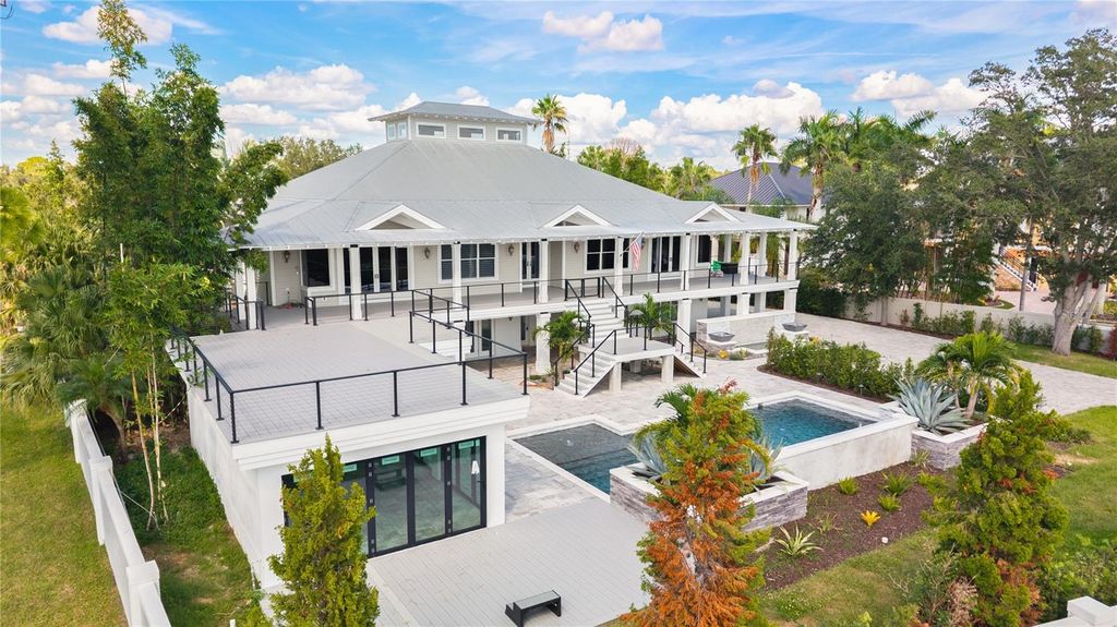 Photo of 80 Shore Drive, Palm Harbor, FL 34683 (MLS # TB8461208)