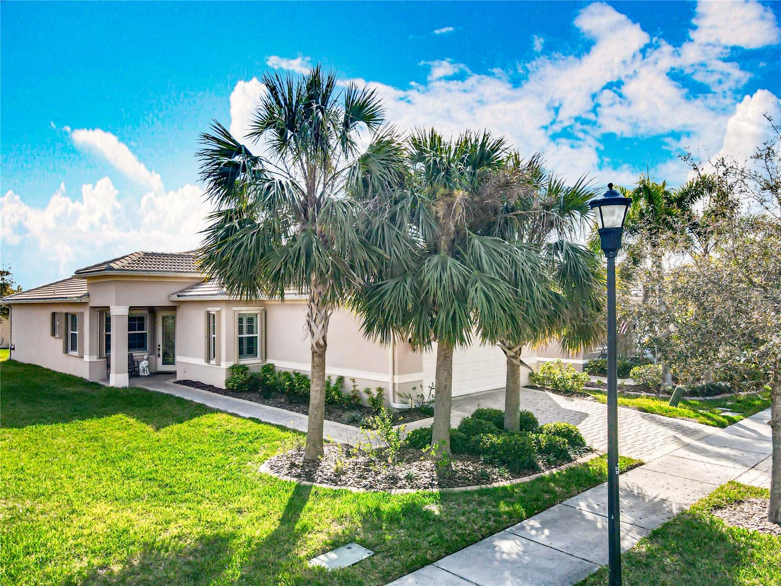 Luxury 3-bedroom, 2-bath home in the sought-after 55+ community of Valencia Lakes, offering resort-style living at its finest. This beautifully upgraded 1,775 sq. ft. home features a gourmet kitchen with granite countertops, high-end stainless steel appliances, luxury vinyl plank flooring, plantation shutters, and crown molding throughout. Enjoy tranquil pond views from the spacious living room and primary suite, which includes built-in walk-in closets and a luxurious en-suite bath. Additional highlights include an extended screened lanai with sealed brick pavers, tile roof, hurricane shutters, and RV/boat parking. Furniture is negotiable. Valencia Lakes residents enjoy access to a 40,000 sq. ft. clubhouse with a heated resort-style pool, lap and resistance pools, fitness center, tennis, pickleball, bocce, and a full calendar of events planned by the on-site Lifestyle Director. Conveniently located near shopping, dining, and medical facilities. This is Florida living at its best!