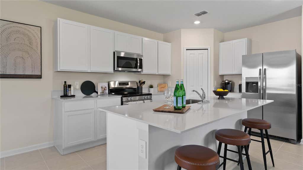 Photo of 5027 Oaks River Street, Davenport, FL 33837 (MLS # O6413759)