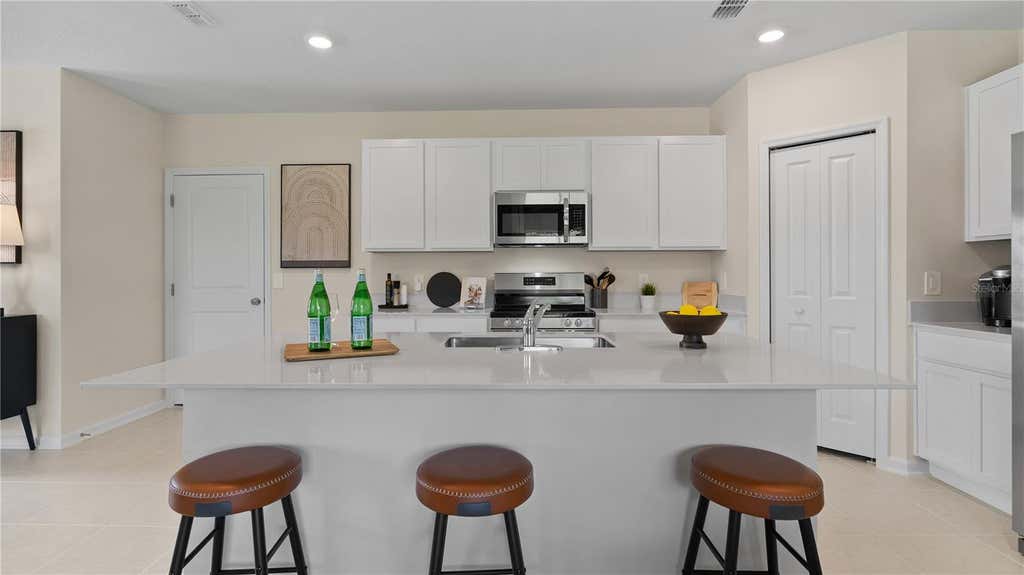 Photo of 5027 Oaks River Street, Davenport, FL 33837 (MLS # O6413759)