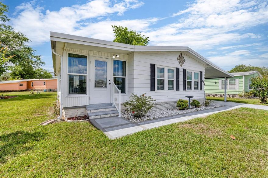 Welcome to Polo Park, a lively 55+ community conveniently located off US-27 in growing Davenport, where you own the land. This two-bedroom, two-bathroom manufactured home has been beautifully updated and is perfect for enjoying the Florida lifestyle. Step inside and be impressed by the open-concept floor plan, flooded with natural light. Recent improvements include a updated kitchen (2020), a new Florida Room (2019), 12 new energy-efficient windows (2018), a new roof (2018), and a new air conditioner (2016). Polo Park offers a full suite of amenities to keep you active and engaged. For just $180 per quarter, residents can enjoy access to two heated community pools, two clubhouses, shuffleboard courts, pickleball, horseshoes, tennis, and bocce. Additionally, Polo Park features a 9-hole executive golf course right in the community! Finally, this volunteer-driven community offers a wide range of daily activities. Conveniently located near Disney, shopping, dining, and local attractions, it's hard to get bored as a Polo Park resident! Come see why Polo Park is the perfect place to call home. Don't wait! Schedule your private tour today!