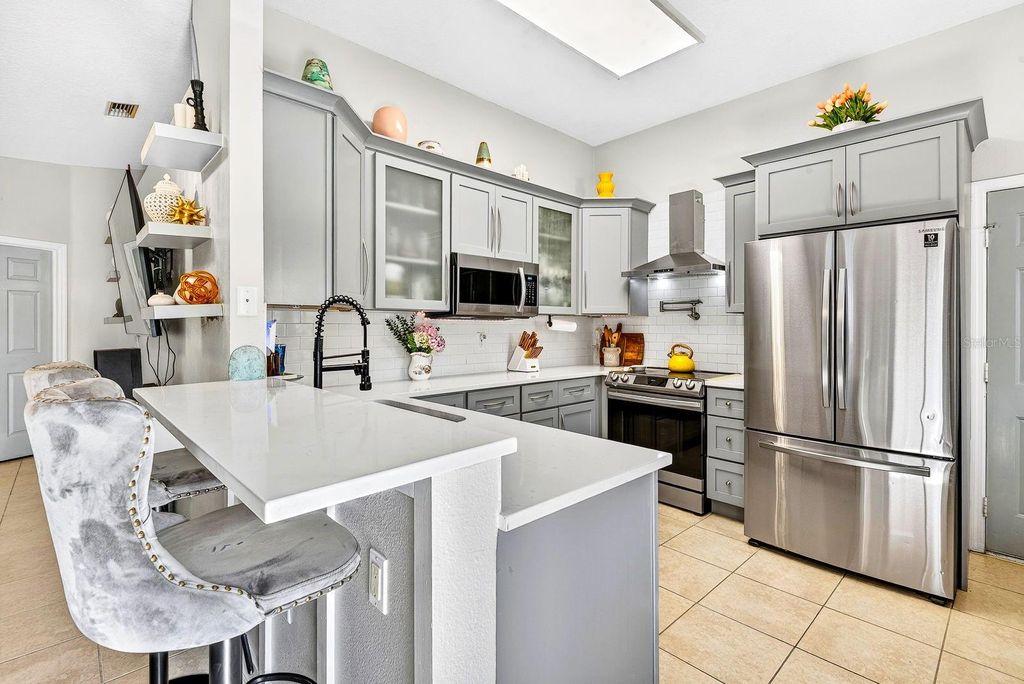 Photo of 519 29th Avenue W, Bradenton, FL 34205 (MLS # A4676512)