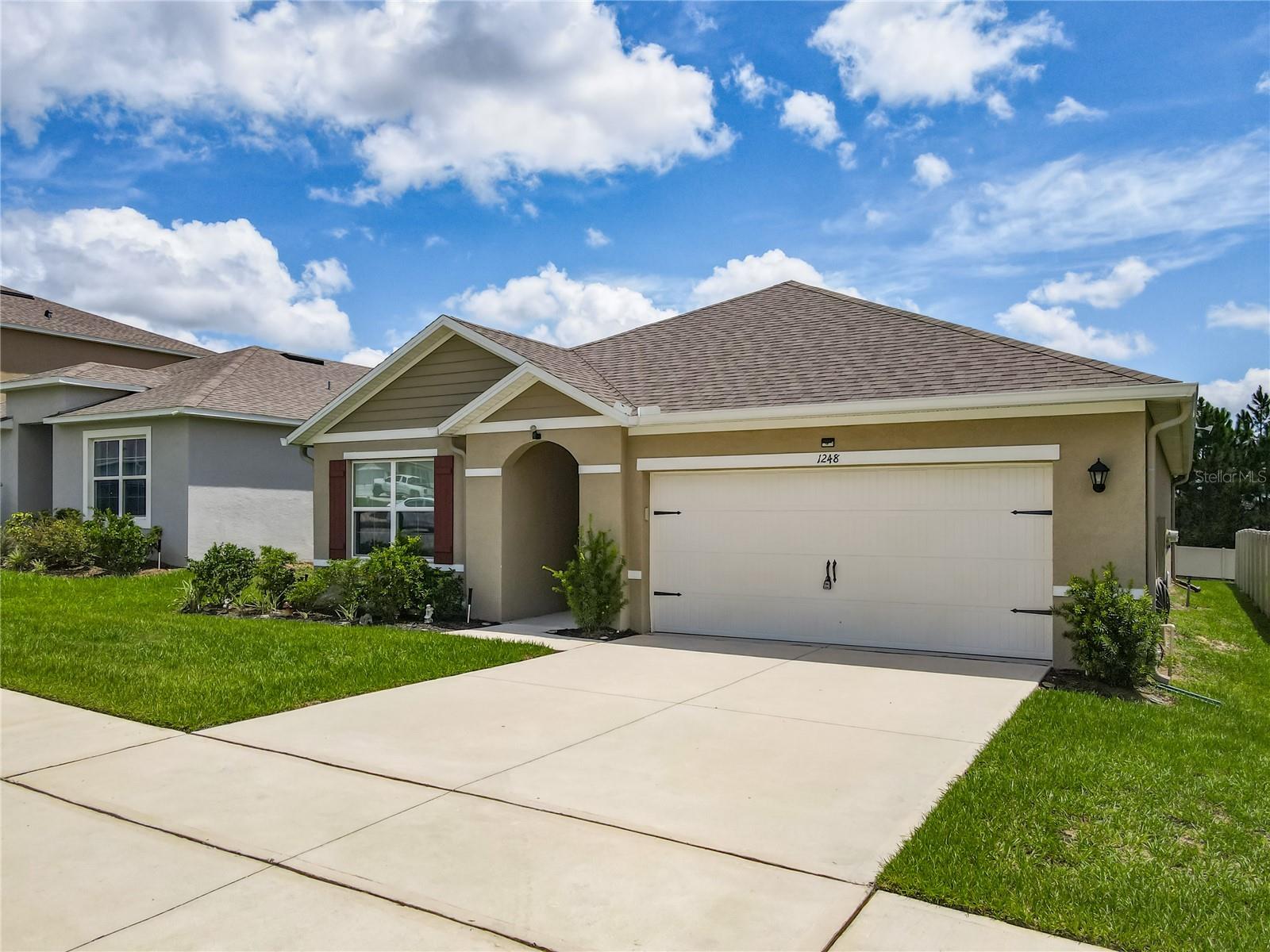 Home has a 3% V.A. ASSUMABLE MORTGAGE. This spacious 3-bedroom, 2-bath home in Davenport is perfect for those seeking a prime location near Central Florida’s famous theme parks. This home offers convenience and comfort in a peaceful neighborhood. With an open floor plan, a bright and airy living area, and a sizable backyard, this home is ideal for families or vacation home buyers. The kitchen features modern appliances and ample storage. The primary suite includes an en-suite bath with a shower, walk in closet. Located in the sought-after Forest Lake community, just off US-27 and minutes from I-4, enjoy quick access to Orlando, Lakeland, and Tampa. Whether you're after adventure or tranquility, Forest Lake offers the best of both worlds.