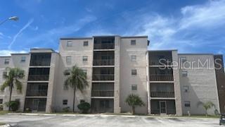 Move in ready fourth floor condo with endless potential awaits you! Welcome to Unit #407 at Royal Richey Village - a charming 1-bedroom, 1-bath condo offering comfort, value, and a canvas ready for your imagination. Whether you're searching for your first home, a second retreat, or a savvy investment opportunity, this unit delivers flexibility and potential in every corner. Some features include: a spacious living room perfect for entertaining or unwinding after a long day, a spacious primary bedroom and updated bath, a screened-in patio for enjoying Florida breezes and quiet moments, and open parking, a community swimming pool, an elevator, and laundry room. Best of all, low monthly HOA fees. Let your creativity shine as you transform this welcoming space into your dream home. With a price tag offering an unbeatable value, it also features a convenient located near scenic parks, popular dining spots and shopping centers. From a stylish starter for an adult child, or downsizing your home, to a weekend getaway, or a next addition to your real estate portfolio -- the possibilities are endless, I've done my part in bringing you this opportunity...now it's your turn to book a showing, imagine the possible and call it yours.