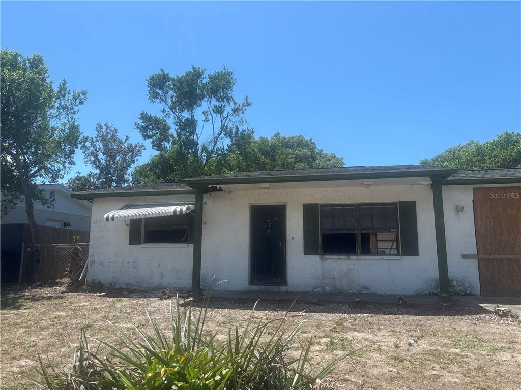 Photo of 8648 Fox Hollow Drive, Port Richey, FL 34668 (MLS # TB8540005)