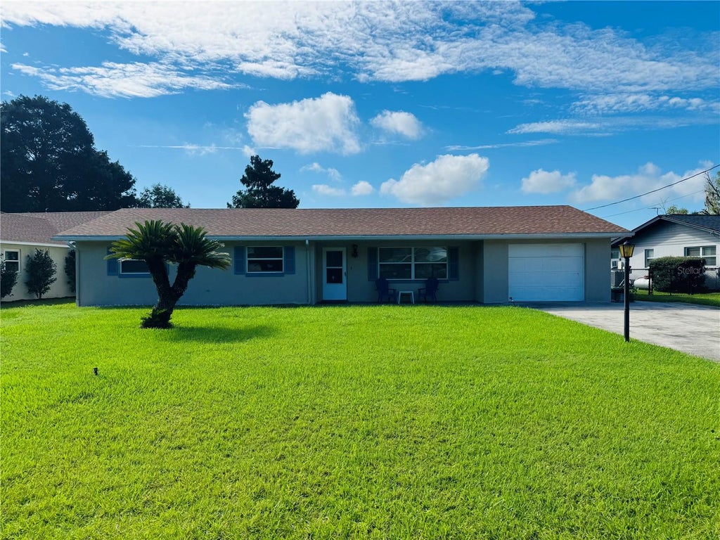 Photo of 28100 Lois Drive, Tavares, FL 32778 (MLS # O6440619)