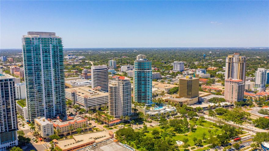 Welcome to a slice of luxury living at its finest in the heart of Downtown St. Petersburg! Situated in the front and center position of the exclusive ONE St. Pete condominium, Unit 1603 provides the most expansive balcony and the widest view available in the building.  These views showcase Albert Whitted Airport, the iconic New St. Pete Pier, The St Pete Yacht Club harbor and long serene views across Tampa Bay.  Just out the front door and within a 5 -10 minute walk are bustling shops, hundreds of restaurants, cafés, bars, museums, and concert venues. Leave your car in one of 2 covered parking spaces in the secure garage for weeks and enjoy the never-ending sunshine of St Petersburg and the Gulf of Mexico.  
Secured entry, secure elevators and full-time concierge welcome residents home and provide pickup for packages.  Step inside Unit 1603 and immediately see a meticulously crafted space, where custom finishes elevate every corner. European oak hardwood floors welcome you, leading to a gourmet kitchen adorned with a breathtaking marble tiled backsplash and quartz countertops, featuring elegant veining that exudes opulence. The living room boasts a mesmerizing mosaic tiled wall, adding an artistic touch to the space. This unit underwent extensive upgrades from its original 2018 builder finishes, boasting Lutron silent automated shades for added convenience, a soothing leather accent wall in the primary suite for a touch of glamour and a stunning acrylic rendering in the primary bath.  Designed with 2 Bedroom Suites, and a 3rd full Bath adjacent to the additional office space, which could also be a 3rd bedroom. Indulge in the epitome of organization with super high-end, lighted California closet buildouts in four closets, and additionally in the laundry area, ensuring seamless storage solutions. The amenities at ONE St. Pete are simply unparalleled, offering expansive workout areas, multiple grilling spots, and entertaining areas around the pool, along with several hot spa tubs and recreation areas.
The location is a dream, perfectly positioned between Central Avenue and 1st Avenue North, just a block away from the Premier Beach Drive, ensuring you're immersed in the vibrant pulse of the city while enjoying a serene waterfront retreat. Don't miss this opportunity to embrace the pinnacle of luxury living in one of St. Pete's newest and most coveted residences!