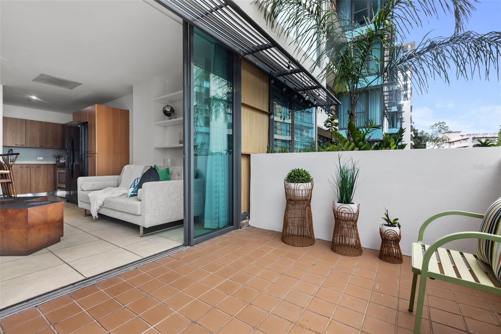 This charming one-bedroom, one bathroom apartment features a spacious terrace that seamlessly connects with the living-dining room and the kitchen. The terrace provides a space for entertaining or just to sit relaxed drinking your morning coffee as you enjoy the sunrise. As far for the unit, it offers a comfortable and enjoyable living space with a range of amenities that cater to your modern lifestyle. The bedroom offers a soothing natural light that creates a tranquil retreat, with an en-suite bathroom and an ample closet space to cater to your storage needs. Other apartment features include central air conditioner, laundry and one cover parking. For extra convenience the building has a full backup generator and water cistern. Nestled in the vibrant neighborhood of Ciudadela in Santurce, this apartment is the perfect blend of comfort and practicality. It has easy access to a range of local amenities, including grocery store, hair salon, gym, restaurants, and entertainment options. Its convenient location and thoughtful facilities make it a wonderful place to call home. Don’t miss out on the opportunity to experience the best of urban living in this lovable apartment.
