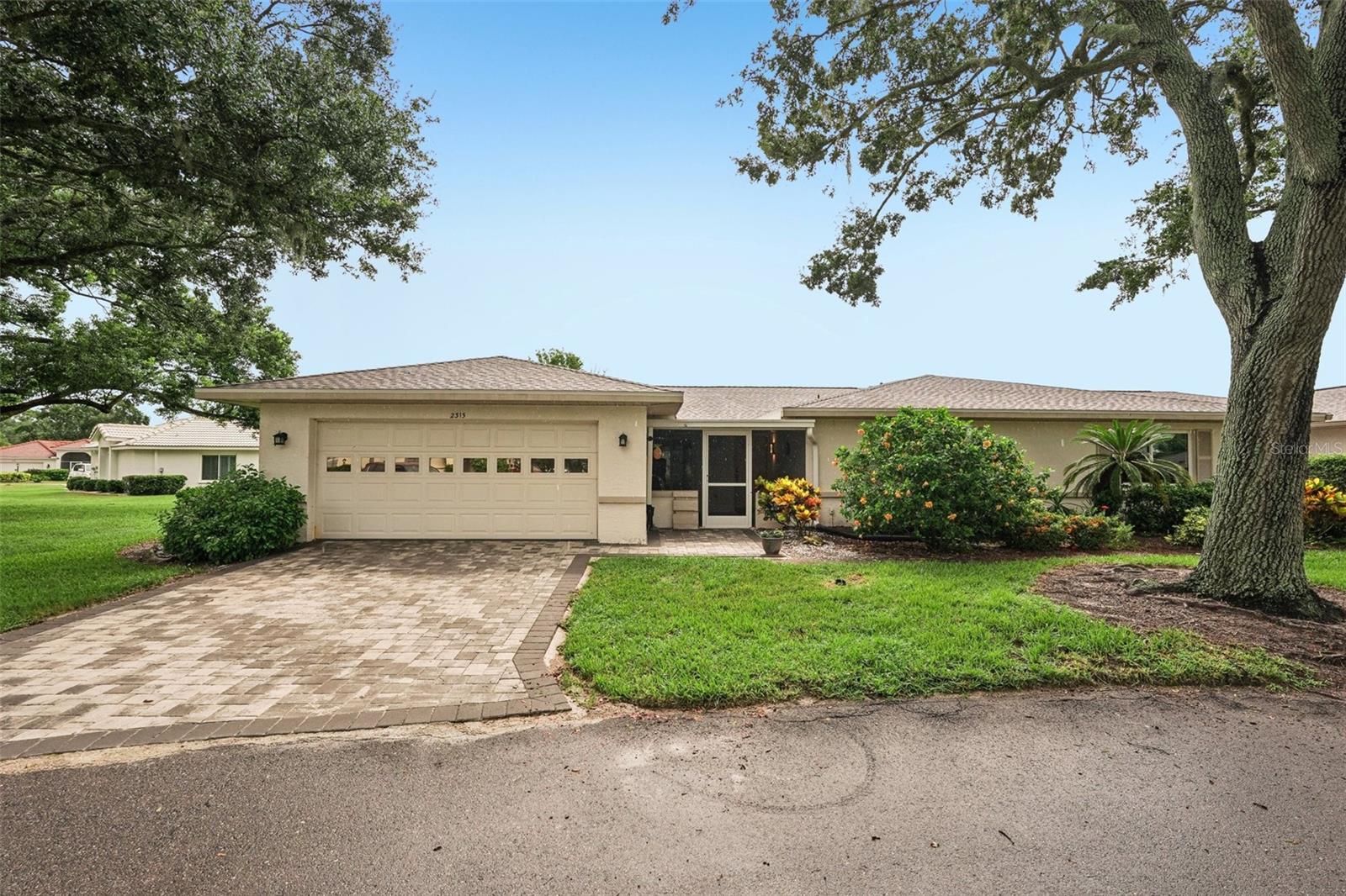 Welcome to this beautifully maintained and fully furnished 2-bedroom, 2-bath condo with a dedicated office, located in the highly sought-after 55+ community of Kings Point in Sun City Center! As you arrive, you're greeted by a charming paver driveway and a spacious 2-car garage. The screened-in front porch is surrounded by mature landscaping, offering a peaceful place to relax.
Inside, you’ll find a spacious living and dining area with gorgeous laminate flooring and plenty of natural light. The large kitchen boasts sleek ceramic tile flooring, an eat-at breakfast bar, abundant wood cabinetry, and stainless steel appliances—perfect for everyday living and entertaining.
Just off the kitchen is a bright and airy Florida room that makes a great additional lounge or hobby space. The expansive primary suite offers newer carpet, two large closets, and a beautifully updated en suite bath with dual sinks, upgraded fixtures, a tiled shower, and elegant glass sliders.
The second bedroom is also generously sized, with dual closets and access to a stunning second bathroom that features new tile, vanity, and fixtures. The office provides an ideal spot for working from home, reading, or extra storage.
This home also features a brand new roof, newer A/C, updated electrical panel, and updated plumbing—providing peace of mind for years to come.
You’ll love the gated community of Kings Point, which has amazing facilities, pools, clubs and events just waiting for you to enjoy. Located between Sarasota and Tampa, this home is perfectly positioned for a convenient ride to airports, great shopping, dining, and professional entertainment. With easy access to award-winning, sandy beaches, you’ll experience the best of all worlds—without the stress of big city life. Leave the hustle behind and embrace a new chapter in Sun City Center, Florida, the state's top-ranked and most affordable 55+ retirement community.
Don’t miss this move-in ready gem in a vibrant golf cart-friendly community filled with resort-style amenities!
