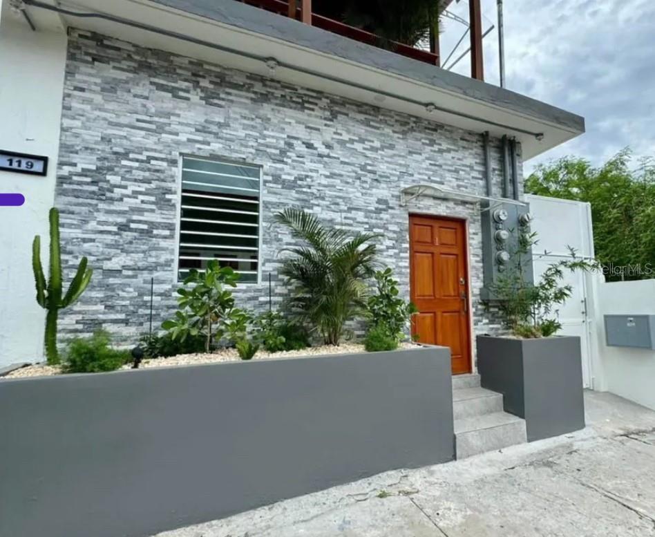 Ready to move-in! Apt-C 2- bedroom,1 bath, second floor fully remodeled and furnished cozy apartment in this multi-family residence located at Santurce's Calle Loiza area with trendy bars and restaurants, the Caribbean Arts District and a short ride to Old San Juan and the Airport. One bedroom, one bathroom, kitchen, family room apartment includes: brand new refrigerator, 3 A/C units, 3 ceiling fans, tankless water heater, sofa, dining room, queen size bed, drawer, living room Smart TV and water cistern. Enjoy the convenience of walking to nearby restaurants, coffee shops, bars, supermarkets, and best of all, to Ocean Park Beach. Monthly rent includes water. Private entrance.