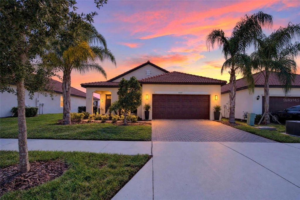 Photo of 17127 Holly Well Avenue, Wimauma, FL 33598 (MLS # TB8558694)