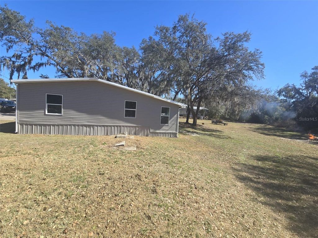Photo of 37344 Stanford Avenue, Zephyrhills, FL 33541 (MLS # O6381689)