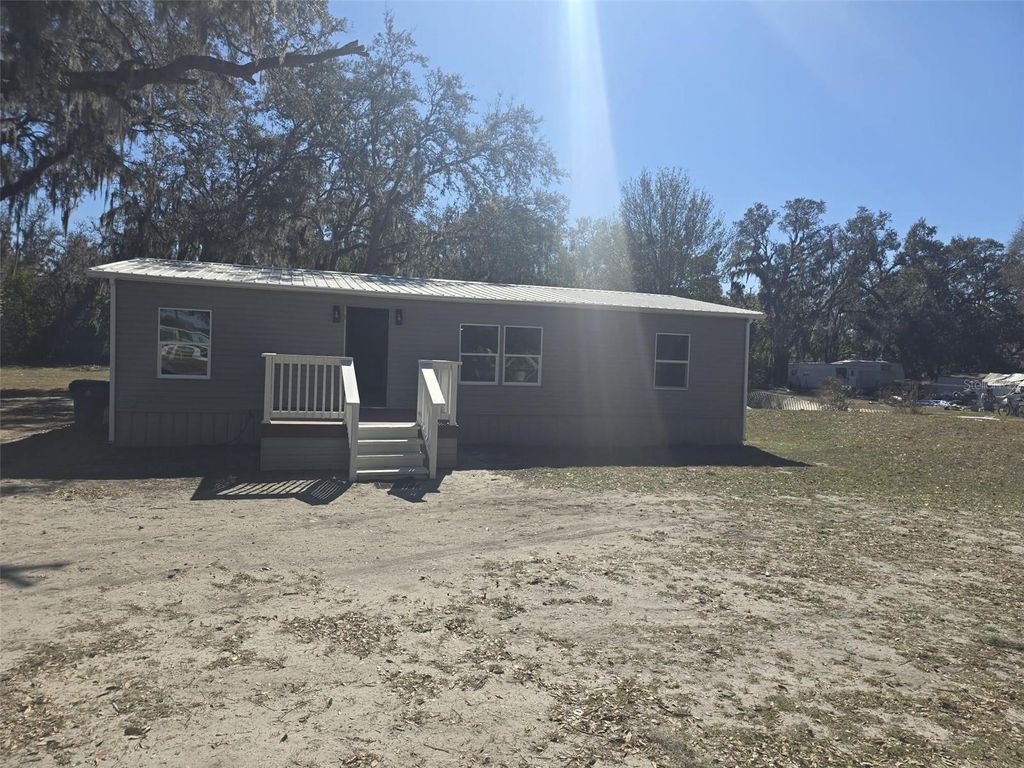 Photo of 37344 Stanford Avenue, Zephyrhills, FL 33541 (MLS # O6381689)