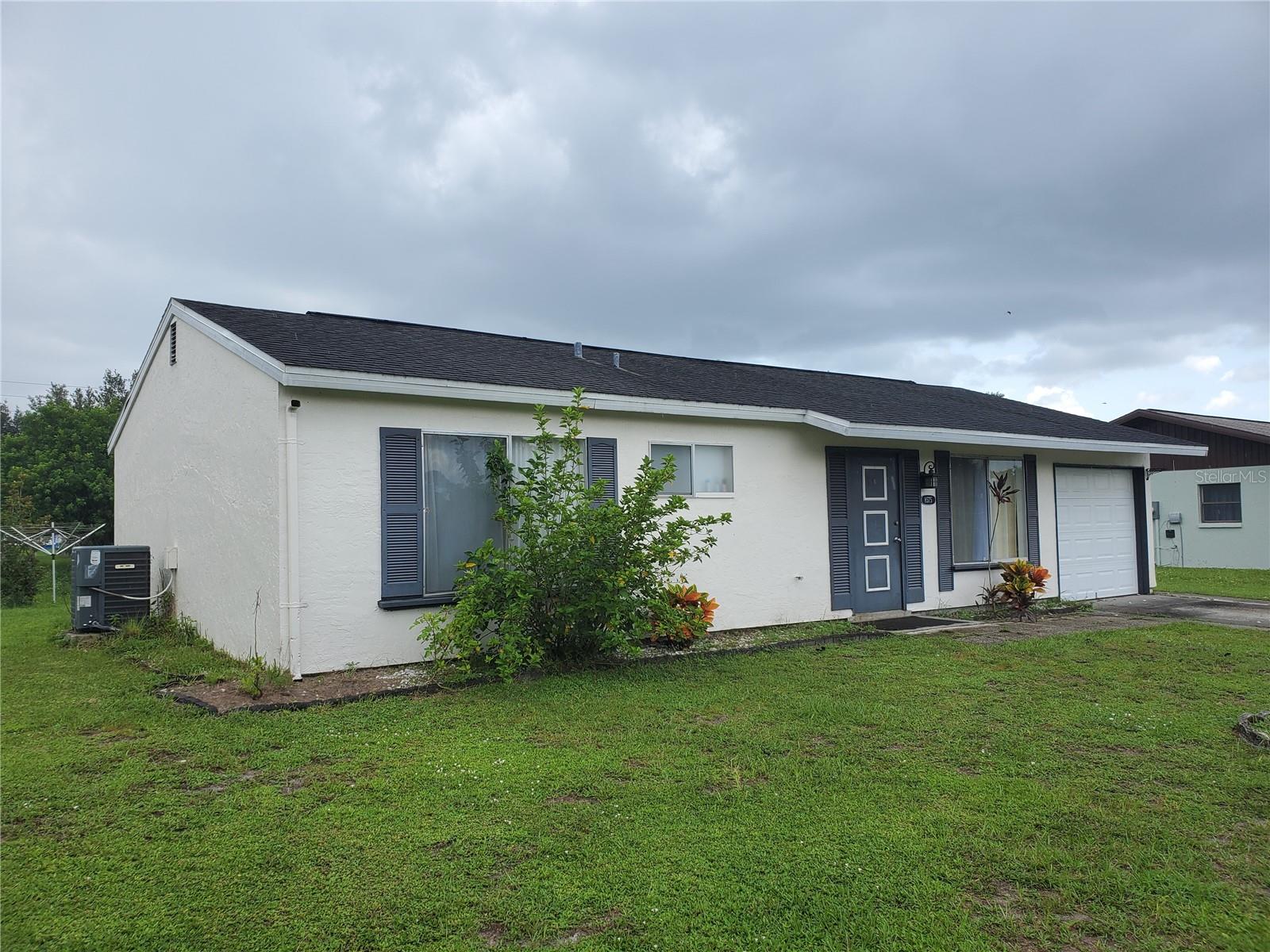 **MLS Listing Description:**
Charming and updated single-family home for rent in the heart of North Port! This 2-bedroom, 1.5-bath home features a modern interior with stylish finishes throughout. The kitchen comes fully equipped with a stove, refrigerator, microwave, and washer/dryer for your convenience. Enjoy the ease of an attached garage with an electric opener, plus a spacious backyard perfect for relaxing or entertaining. The year-round Florida room is currently being renovated and will be completed for the new tenant's enjoyment. Fresh exterior paint is also scheduled. Located in a quiet neighborhood with easy access to shopping, dining, and major roadways. Don’t miss your chance to make this beautifully updated home your own!