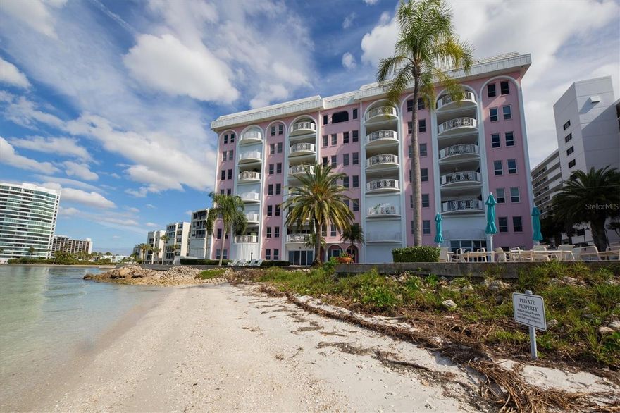 Gorgeous views overlooking Sarasota Bay, with your own private beach. Turnkey annual furnished rental includes everything except electric and internet. Just a short stroll to the vibrant downtown arts, culture, award-winning local dining and more. As you enter this spacious over 1,500-square-foot home, you will be drawn to the stunning views of the bay. This rarely available three-bedroom, two-bath end-unit condominium is ready for you, just bring your toothbrush. This lovely home has been given a fresh makeover from stem to stern with stainless steel appliances, granite countertops and wood cabinetry in the kitchen, new baths, all tile throughout, and contemporary furnishings to make this the place to call home. The primary bedroom has a king bed, ample closet space and an updated bath. The second and third bedrooms have queen beds and the guest bath is also updated. One covered parking space along with plenty of guest parking.
