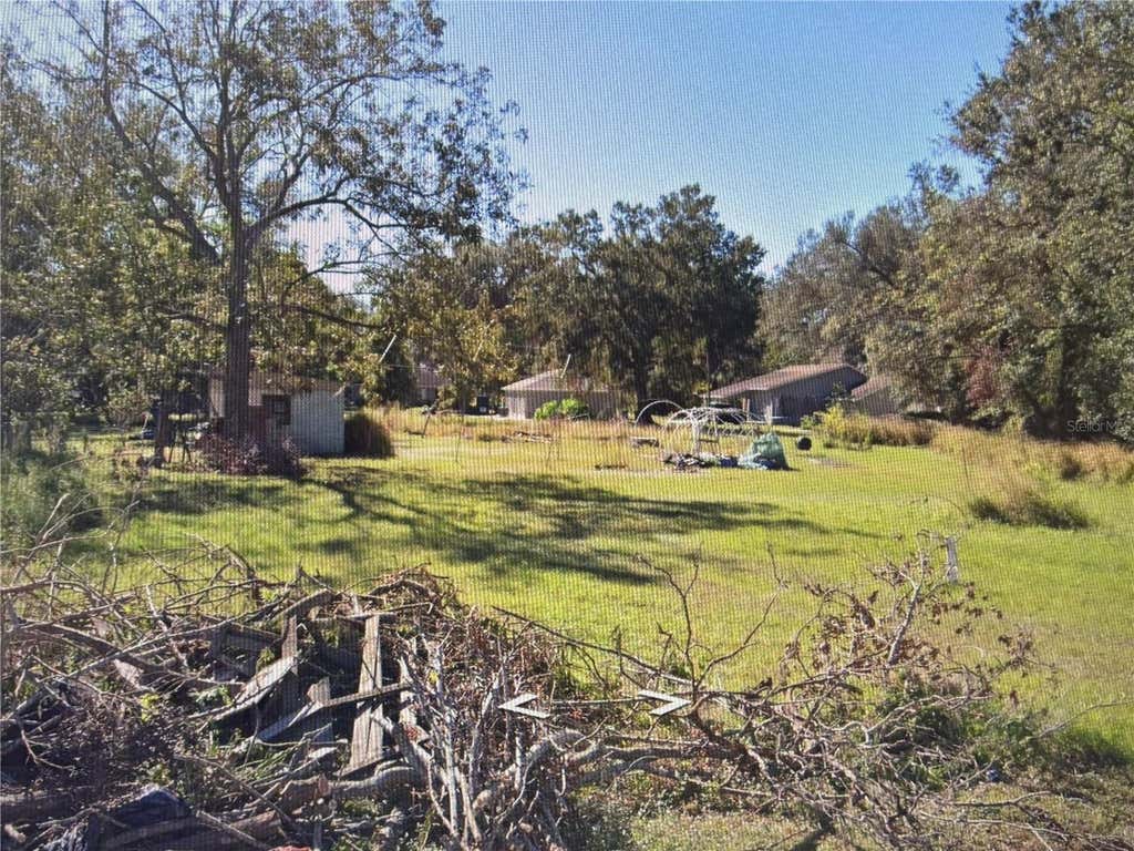 Photo of 109 SW Dr Martin Luther King Jr Street, Fort Meade, FL 33841 (MLS # A4699470)