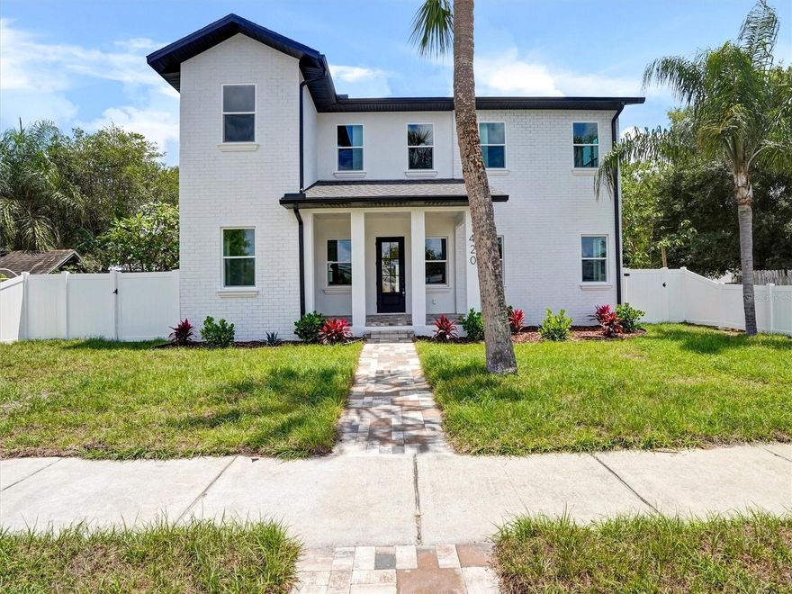 Brand-new construction in a prime St. Petersburg location, this 5-bedroom, 4-bath home offers a thoughtfully designed two-story layout with two primary suites — one on each floor — plus a separate private office. The main level features an open living area with a built-in TV nook, a spacious dining area, a well-appointed kitchen with generous counter space, a large island, and a convenient wet bar. The first-floor primary suite provides excellent flexibility for guests, multi-generational living, or an additional owner’s retreat, while two full bathrooms on the main level add everyday convenience — including one perfectly positioned for future pool or backyard use.

Upstairs, the second primary suite features a large walk-in closet and a spa-inspired bath with dual vanities, a soaking tub, and a separate shower. Three additional bedrooms, another full bath, and an upstairs utility room complete the second floor. The backyard offers plenty of room to add a pool, creating the opportunity for a true outdoor retreat. A rare detached 3-car garage sits at the rear of the property with 10-foot ceilings and taller 8-foot garage doors, offering excellent space for an RV, boat or other toys. The garage also provides future flexibility for possible conversion to an in-law suite or the potential to construct an ADU above. Conveniently located just minutes from downtown St. Petersburg, waterfront parks, dining, arts, and Gulf Coast beaches, this new construction home combines luxury, flexibility, and exceptional long-term potential.