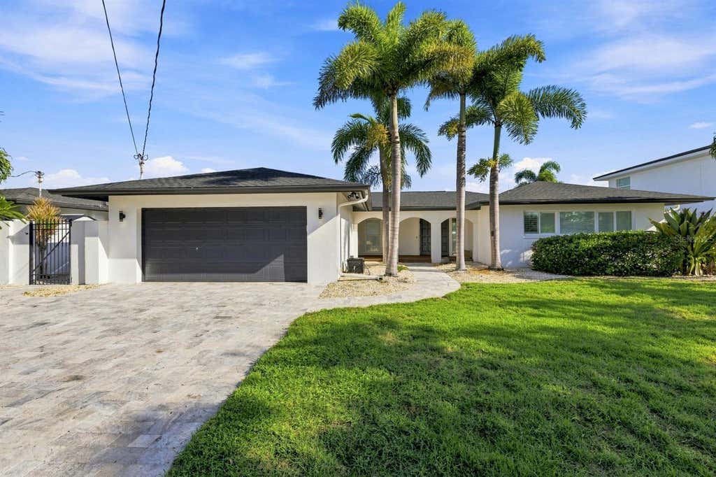 Photo of 320 Palm Island NE, Clearwater Beach, FL 33767 (MLS # TB8537797)