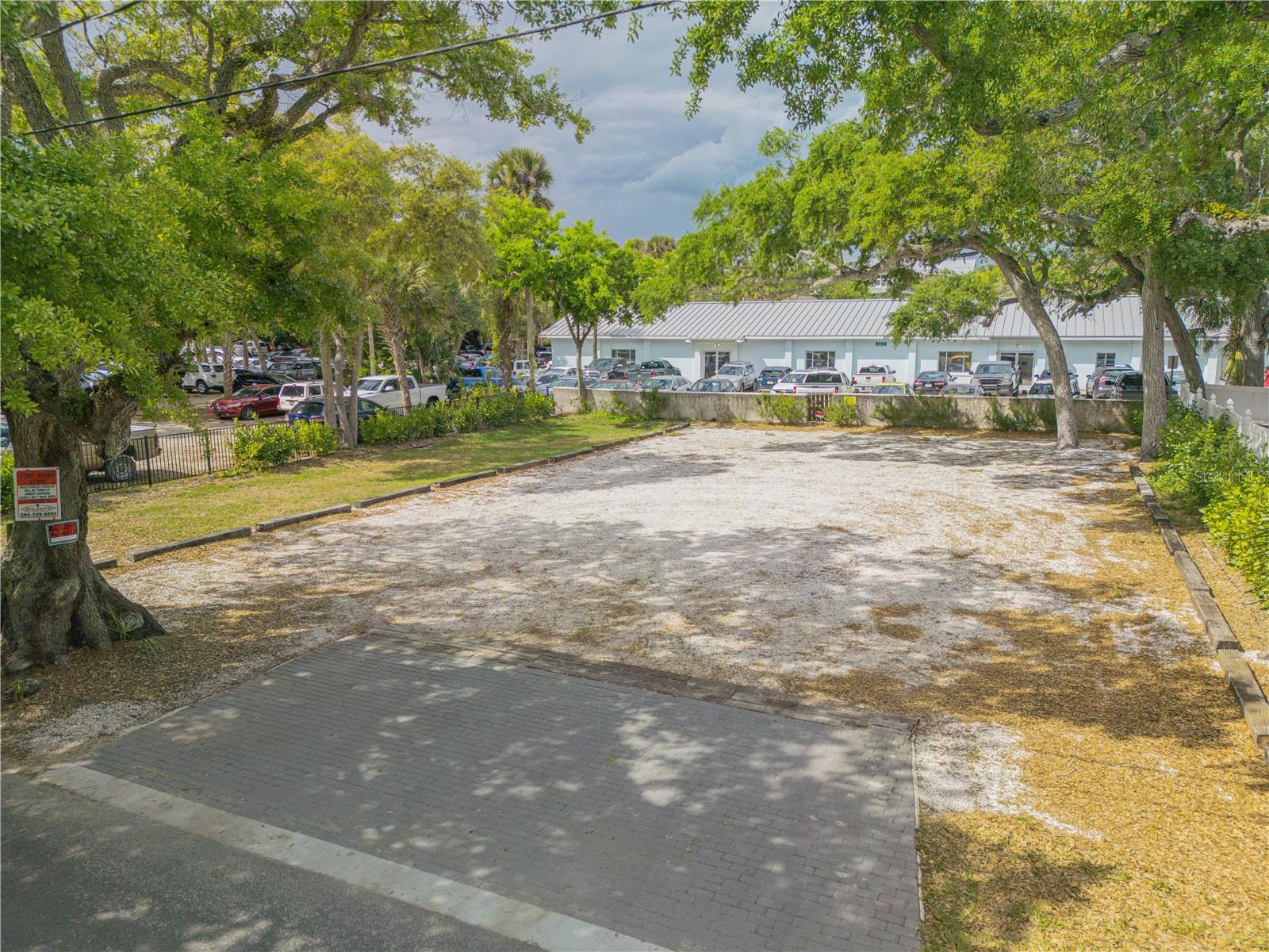 Perfectly located Mixed Use zoned lot in New Smyrna Beach right off Flagler Ave and walking distance to all restaurants, shops, the beach and the intracoastal waterway. Endless income potential currently developed as a parking lot with 21 parking spots since Flagler Ave has a huge shortage of parking spaces due to the huge demand and activity on Flagler Ave. This lot can also be developed and built up to a 45' tall building for commercial, personal or residential use.