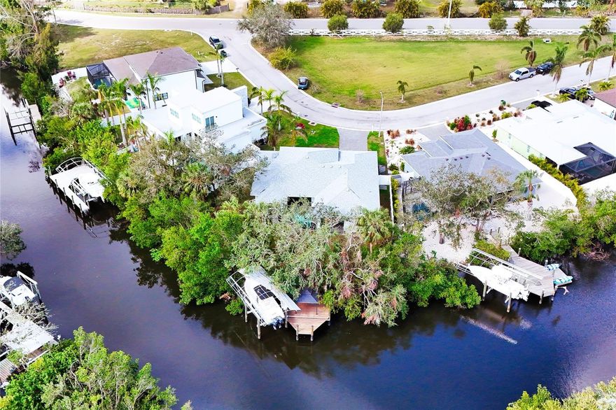 Waterfront Paradise with Gulf Access and comes fully furnished! Come discover this impressive blend of modern and luxury of waterfront home and experience what a True Florida Living Lifestyle is all about!  A well suited waterfront property offered a Private Pool, Private Dock with built-in boat LIFT and access to the GULF Coast for a slice of paradise.  This property is a dream for boaters and outdoor enthusiasts.  This home was built in 2021, an extravagant split floor plan offered high ceilings, hurricane impact windows, abundance of natural lights, modern luxury, designer ceiling fans and lighting fixtures and contemporary finishes.  The single residence boasts of 1,825 square feet of meticulously designed living space, featuring 3 spacious bedrooms, an office and 2 well-appointed bathrooms.  A Gourmet kitchen features modern stainless steel appliances, sleek cabinetry, and luxury stone countertops.  The Master Suite bedroom offers a tranquil retreat with en-suite bathroom featuring dual sinks and spacious walk-in shower.  Spacious concept living area with large sliding glass doors leading to the pool area and covered patio. A perfect blend of modern and elegant.  The private Outdoor Oasis offers sparkling pool, lush landscaping and wide stretch of breathtaking waterview which is perfect setting for relaxation.  The custom boat dock with a built-in boat lift that's currently storing a 27 foot Triton boat.  Full access to the Gulf Coast directly from your brackish water canal.  Fishing, kayaking, or watching wildlife from your own backyard or boating jet skiing out in the bigger water.  All situated on a 9,500 square foot lot located in a Hidden Lagoon Community.  Residents enjoy a peaceful environment with low HOA Fees.  Either relaxing on your own private Oasis or out on the Gulf Coast doing deep sea fishing or catching that perfect sunset or hitting a sandbar, this is Florida living at its best.  Centrally located: minutes to downtown Bradenton, I-75, US 19/41, restaurants, grocery stores, 27 minutes to Anna Maria, 23 minutes to Sarasota,  33 minutes to St. Pete, 47 minutes to TPA, beaches and all other amenities are all within minutes.  Don't miss the opportunity, this is a true Florida living lifestyle.  Schedule your private showing today and own a slice of paradise! Equal Housing Opportunity.