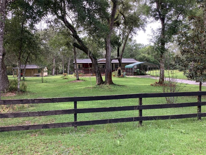Beautiful 3 acres surrounds this large, spacious 4 bedroom, 2 bath split plan manufactured home.  Enjoy your quiet time on your 10x52 front porch and relax or entertain on large covered 16x40 rear porch.   This home offers a large roomy kitchen with island with lots of cabinets, spacious dining area, inside utility,  large master suite and bath with double vanity, garden tub, walk-in shower, and walk-in closet.  The split floor plan allows for privacy.  This home sits on a treed, park like setting 3.7 acres with a 16x 24 workshop.  This home is located on a quiet paved road in a rural setting yet with easy access to I-75 and Hwy.50.  Centrally located to Tampa, Orlando and Ocala areas.  Also located nearby are several recreational areas for the outdoor enthusiast like the Rails to Trails, Withlacoochee River, Withlacoochee State Forest, Silver Lake and camp ground areas, Croom motorcycle area.  For the beach goers, we are near Pine Island, Weeki Wachee Springs and many other recreational areas.  This property won't last long!  Call for showing.