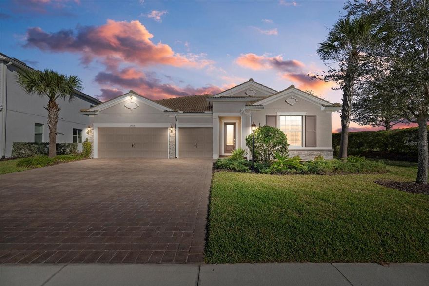 This home shows like a model and has been impeccably maintained. Used only seasonally, it’s been lightly lived in and remains in exceptional condition. Furnishings are available as an option. Located in the highly sought after village of Mallory Park in Lakewood Ranch, this exquisite Creekview model offers 4 bedrooms, 3 bathrooms, a 3-car garage with a 4 foot
extension, and a versatile flex room—perfect as a home office, playroom, additional family room, or even a fifth bedroom. This home is truly
move-in ready and showcases designer finishes throughout, including plank tile flooring, elegant stone countertops, and soaring 12-ft ceilings in
the open-concept great room. The chef’s kitchen is perfect for entertaining, featuring a large island, walk-in pantry, and expansive slider doors
that open to an extended lanai. Step outside to your private backyard oasis with a custom pool, outdoor kitchen, and screened cage—ideal for
year-round enjoyment. The thoughtfully designed split-bedroom floor plan offers privacy, with a spacious primary suite featuring an ensuite bath,
walk-in shower, double vanities, and generous closet space. Situated in a gated community, Mallory Park boasts resort-style amenities, including a
fitness center, clubhouse, pool & hot tub, fire pits, basketball & pickle-ball courts, playgrounds, and private access to top-rated schools and Bob
Gardner Park. Conveniently located near Lakewood Ranch Main Street, Waterside, and University Town Center, with quick access to I-75,
downtown Sarasota, downtown Bradenton, and the breathtaking Gulf Coast beaches. Easy commuting to St. Petersburg, Tampa, and even
Orlando! Don't miss this exceptional opportunity to own a beautifully upgraded home in one of Lakewood Ranch's most desirable communities!