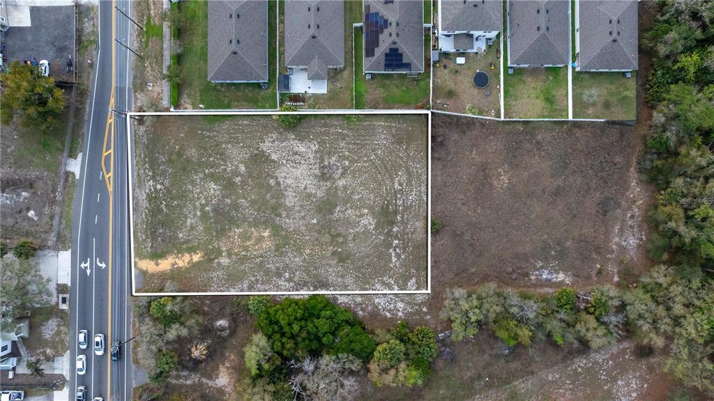 Photo of 6211 County Road 547 N, Davenport, FL 33837 (MLS # O6389526)