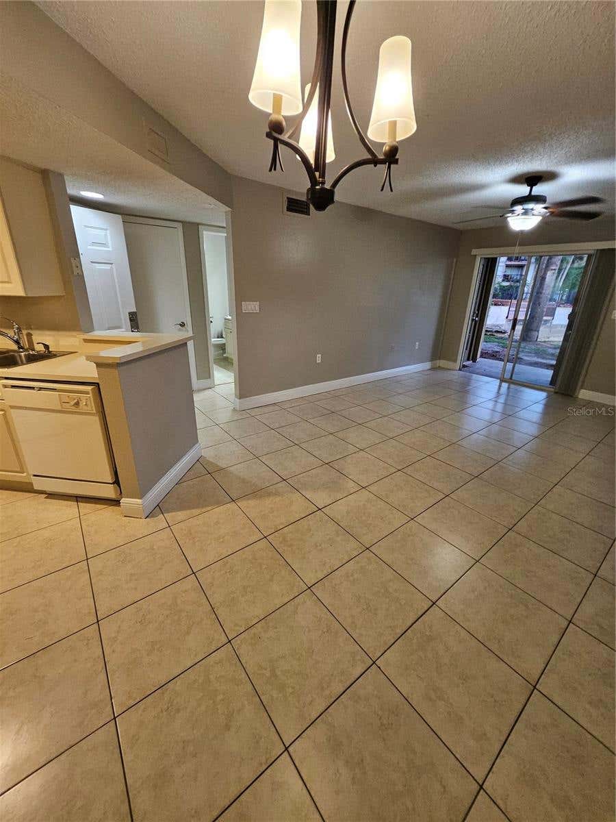 Photo of 1908 Lake Atriums Circle #15, Orlando, FL 32839 (MLS # O6432823)