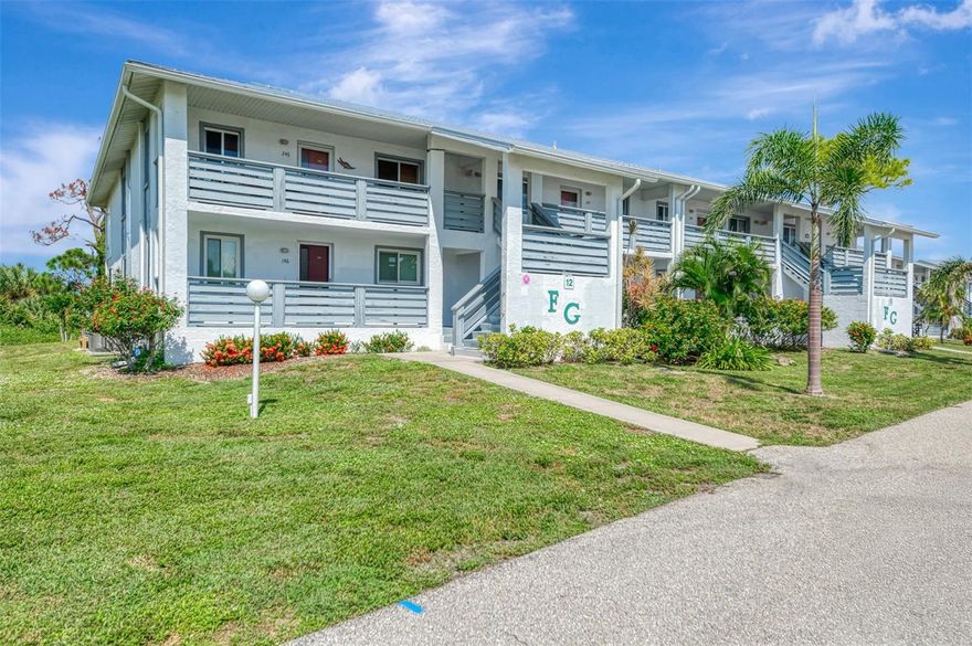 With safety at the forefront, this is the condo for you.  This 2 bedroom, 2 bath, first floor end unit is located in the popular community of Fiddlers Green II, and as per the owners, it went through Hurricanes Ian, Helene, and Milton, with absolutely no damage.  It features electric roll down shutters on the lanai which keeps the unit buttoned-up during any inclement weather, and hurricane impact windows (Renewal by Anderson) have been installed in March of 2023.  In April 2023, the lanai was was refinished with an epoxy so that it is waterproof, and easy to maintain.  Upgrades also include new electric and a new electrical panel, which was done for the the entire building and new metal roofs throughout the community.  This well-maintained unit is being offered TURNKEY FURNISHED for the convenience of the buyer, and even includes a bicycle.  The unit features sliding glass doors from the living room and the primary bedroom to the lanai with views of the Wildflower Preserve and screen door for easy access to the rear of the building . Fiddlers Green II is a very friendly community with many amenities, including a community pool, tennis and shuffleboard courts, BBQ areas, an exercise room, community center, and activities galore.  You are conveniently located close to great restaurants, shopping, golf courses, beautiful Gulf beaches, and excellent boating and fishing.  Grab your piece of the Florida sun; make your appointment today.