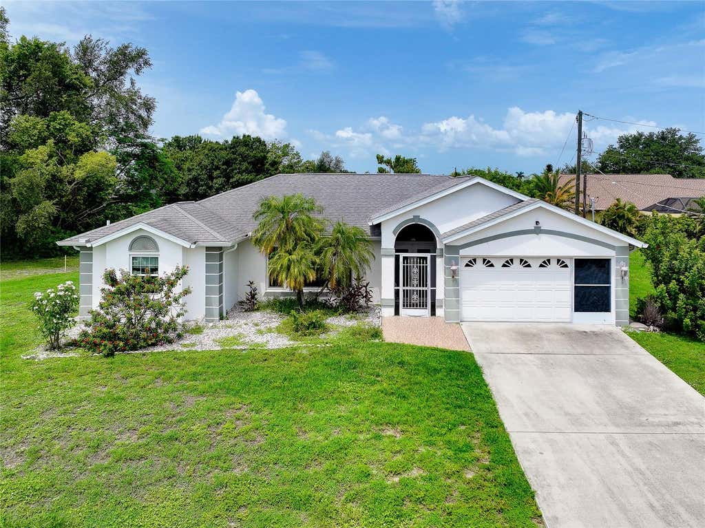 Photo of 282 Warwick Street NW, Port Charlotte, FL 33952 (MLS # N6144985)