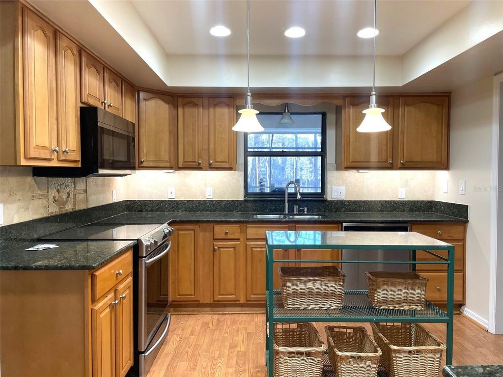 Photo of 3408 Valley Ranch Drive, Lutz, FL 33548 (MLS # TB8472690)