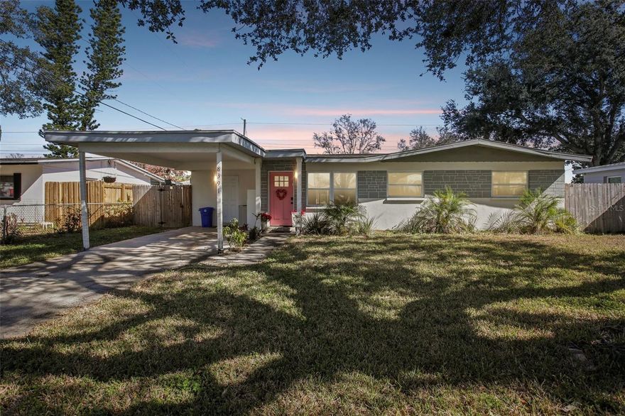 This thoughtfully designed 3-bedroom plus den, 2-bath pool home offers comfort, flexibility, and easy Florida living. Upon entry, a spacious living and dining area creates an inviting first impression, providing plenty of room to relax or entertain. The kitchen is both functional and stylish, featuring stainless steel appliances, a breakfast bar, and a pantry for added storage.

A generously sized den with direct patio access adds valuable versatility, making it ideal for a home office, media space, or additional living area. The primary bedroom also opens to the lanai and includes an ensuite bathroom, creating a private retreat. Two additional bedrooms share a full bath, while a dedicated laundry room adds everyday convenience.

Outdoors, the private pool and expansive lanai set the stage for relaxed afternoons and effortless gatherings. The fully fenced backyard provides room to enjoy the outdoors and includes a storage shed for added functionality. Vinyl flooring runs throughout the home, and the roof was replaced in 2022, offering peace of mind.

Additional highlights include a 1-car carport, no HOA, and no flood insurance required. Conveniently located near shopping, dining, beaches, and more, this home delivers both lifestyle and location.