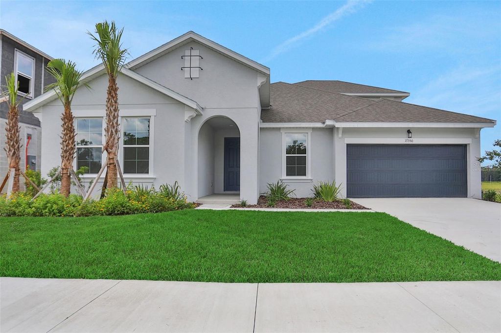 Photo of 17350 Crisp Apple Lane, Land O Lakes, FL 34638 (MLS # G5094584)