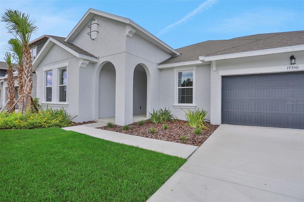 Photo of 17350 Crisp Apple Lane, Land O Lakes, FL 34638 (MLS # G5094584)