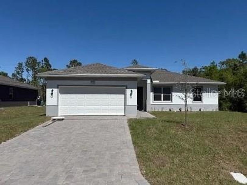Photo of 23414 Racine Avenue, Port Charlotte, FL 33980 (MLS # C7517955)