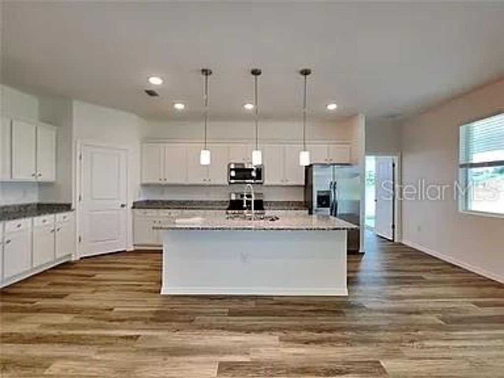 Photo of 23414 Racine Avenue, Port Charlotte, FL 33980 (MLS # C7517955)